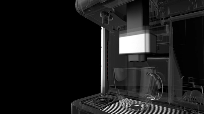 WMF espresso machine ready to dispense coffee into a clear mug on a drip tray, against a dark backdrop
